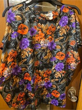FOCAL POINT Floral Cold-Shoulder Blouse in Black with Orange & Purple Blooms